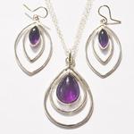 Sterling Silver and Amethyst necklace and earring set.  This set retails for $180.
