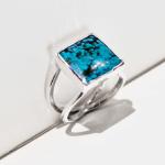 This is a sterling silver ring set with a square turquoise stone.  The ring is $50 before tax and shipping.